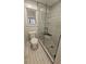 Stylish bathroom featuring glass enclosed shower with tile accents at 695 Pine Shadows Dr, Dallas, GA 30157