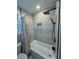 Modern renovated bathroom with updated fixtures and shower/tub combo at 695 Pine Shadows Dr, Dallas, GA 30157