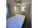 A well-lit room with a ceiling fan, neutral paint, and carpet at 695 Pine Shadows Dr, Dallas, GA 30157
