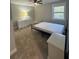 Neutral bedroom featuring a ceiling fan, carpet, and window that provides natural light at 695 Pine Shadows Dr, Dallas, GA 30157