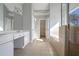 Bright bathroom features double vanity, walk-in shower, and soaking tub at 2165 Parkview Nw Run, Atlanta, GA 30318