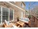 This lovely deck features natural wood furniture and stylish cushions, perfect for outdoor relaxation and entertaining at 2165 Parkview Nw Run, Atlanta, GA 30318