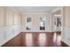 Bright dining room featuring hardwood floors, large windows, and detailed trim at 2165 Parkview Nw Run, Atlanta, GA 30318