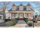Charming home featuring a welcoming front porch,dormers, and well-maintained landscaping at 2165 Parkview Nw Run, Atlanta, GA 30318