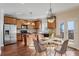 Well-equipped kitchen featuring stainless steel appliances, breakfast nook, and wood cabinetry at 2165 Parkview Nw Run, Atlanta, GA 30318
