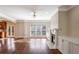 Bright living room featuring hardwood floors, fireplace, and ample natural light from large windows at 2165 Parkview Nw Run, Atlanta, GA 30318