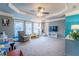 Bright, neutral room features lots of natural light, recessed ceiling with fan, and plenty of carpeted floor space at 4621 Wehunt Commons Se Dr # 7, Smyrna, GA 30082