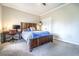 Serene bedroom with a rustic wood bed frame, a desk, and a ceiling fan at 4621 Wehunt Commons Se Dr # 7, Smyrna, GA 30082