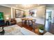 Beautiful dining space with hardwood floors, a view to the kitchen, and modern furnishings at 4621 Wehunt Commons Se Dr # 7, Smyrna, GA 30082