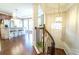 Entryway featuring a staircase, hardwood floors, and stylish pendant light at 4621 Wehunt Commons Se Dr # 7, Smyrna, GA 30082