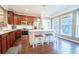 Stylish kitchen with dark wood cabinets, stainless steel appliances, and large central island at 4621 Wehunt Commons Se Dr # 7, Smyrna, GA 30082