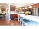 Charming kitchen boasts stainless steel appliances, a large island, and wood flooring at 4621 Wehunt Commons Se Dr # 7, Smyrna, GA 30082