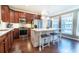 Beautiful kitchen with an island, hardwood floors, stainless steel appliances, and natural light at 4621 Wehunt Commons Se Dr # 7, Smyrna, GA 30082