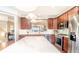 Modern kitchen with stainless steel appliances, center island, and stylish lighting at 4621 Wehunt Commons Se Dr # 7, Smyrna, GA 30082