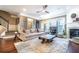 Inviting living room with a fireplace, hardwood floors, and a ceiling fan at 4621 Wehunt Commons Se Dr # 7, Smyrna, GA 30082