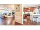 Inviting living room and kitchen with hardwood floors and stainless steel appliances at 4621 Wehunt Commons Se Dr # 7, Smyrna, GA 30082
