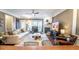 Open-concept living room with fireplace, hardwood floors, and cozy seating area at 4621 Wehunt Commons Se Dr # 7, Smyrna, GA 30082