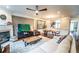 Comfortable living space flowing into the dining area, with a fireplace and hardwood floors at 4621 Wehunt Commons Se Dr # 7, Smyrna, GA 30082