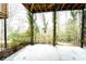 Covered patio provides an outdoor area with private backyard landscaping at 4621 Wehunt Commons Se Dr # 7, Smyrna, GA 30082