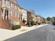 Charming street view of well-maintained brick townhomes in a desirable neighborhood at 4621 Wehunt Commons Se Dr # 7, Smyrna, GA 30082