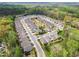 Aerial shot of a community of homes, surrounded by mature trees and greenery at 161 Grace Cir, Acworth, GA 30102