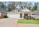 Charming single-story home with a well-manicured lawn and inviting front porch seating area at 161 Grace Cir, Acworth, GA 30102