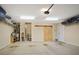 A functional garage with water heater and a convenient sliding door, maximizing space and utility at 161 Grace Cir, Acworth, GA 30102