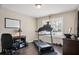 Home office with a treadmill and large window providing natural light at 161 Grace Cir, Acworth, GA 30102