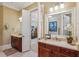 Bathroom with double vanity, marble countertops and large mirror at 19 Lindley Nw Ave, Marietta, GA 30064