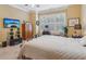 Comfortable bedroom featuring a ceiling fan, large window, and flatscreen tv at 19 Lindley Nw Ave, Marietta, GA 30064
