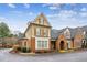 Charming multi-story home featuring a blend of materials and a beautifully landscaped circular driveway at 19 Lindley Nw Ave, Marietta, GA 30064