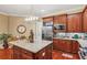 Gourmet kitchen featuring a granite island, stainless steel appliances, and custom cabinetry at 19 Lindley Nw Ave, Marietta, GA 30064