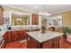 Spacious kitchen with island, granite countertops, and stainless-steel appliances at 19 Lindley Nw Ave, Marietta, GA 30064