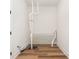Unfinished basement space features new flooring, a sump pump, and all-white walls at 220 Alcovy Terrace, Alpharetta, GA 30009
