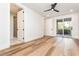 Bright bedroom with hardwood flooring, ensuite bathroom, and access to the balcony at 220 Alcovy Terrace, Alpharetta, GA 30009