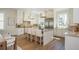 Modern kitchen featuring a large island with bar seating and stainless steel appliances at 220 Alcovy Terrace, Alpharetta, GA 30009