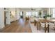 Beautiful hardwood flooring with open concept view of kitchen and fireplace at 220 Alcovy Terrace, Alpharetta, GA 30009