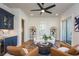 Living room boasts built-in bar, hardwood floors, and stylish decor at 220 Alcovy Terrace, Alpharetta, GA 30009