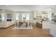 Open-concept living room, dining room, and kitchen with lots of natural light at 220 Alcovy Terrace, Alpharetta, GA 30009