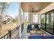 Scenic outdoor patio with a wooded view and comfortable seating at 220 Alcovy Terrace, Alpharetta, GA 30009