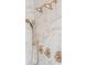 Close up detail of the shower fixtures inside a luxurious modern bathroom at 220 Alcovy Terrace, Alpharetta, GA 30009