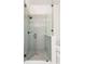Modern shower with glass door, gray tile, and sleek black fixtures at 220 Alcovy Terrace, Alpharetta, GA 30009