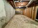 Unfinished basement awaits your custom design with exposed duct work and concrete floor at 560 Hunt River Way, Suwanee, GA 30024