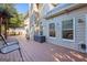 Side view of spacious deck featuring casual seating, grill and outdoor storage at 560 Hunt River Way, Suwanee, GA 30024