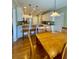 Bright kitchen with white cabinets, stainless appliances, and a breakfast bar, ideal for casual dining and entertaining at 560 Hunt River Way, Suwanee, GA 30024