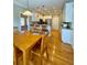 Eat-in kitchen featuring white cabinets, stainless steel appliances, and granite countertops for meal prep at 560 Hunt River Way, Suwanee, GA 30024