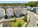 Aerial view of a modern townhome community with landscaped grounds and convenient street access at 914 Martin Nw St, Atlanta, GA 30318