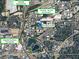 Aerial view of the property and surrounding Westside Reservoir Park and The Works-Top Golf Star Provisions neighborhoods at 914 Martin Nw St, Atlanta, GA 30318