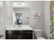 Lovely bathroom with a modern vanity and decorative wall art at 914 Martin Nw St, Atlanta, GA 30318