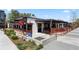 Stunning exterior view of a restaurant with an outdoor patio area, showcasing landscaping, walkway, and cozy outdoor setting at 914 Martin Nw St, Atlanta, GA 30318